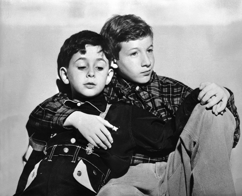 black and white photo of Robert and Michael Meeropol as children